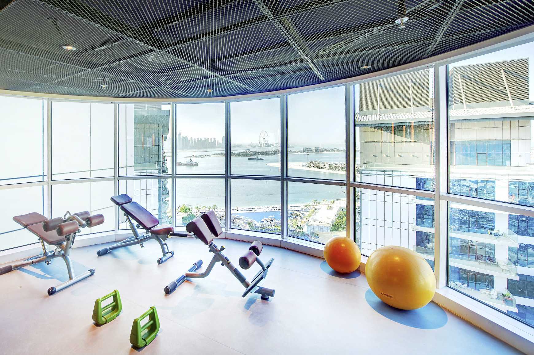 Fitnessruimte in Dukes The Palm, een Royal Hideaway Hotel op Dubai Palm Jumeirah, Verenigde Arabische Emiraten.
