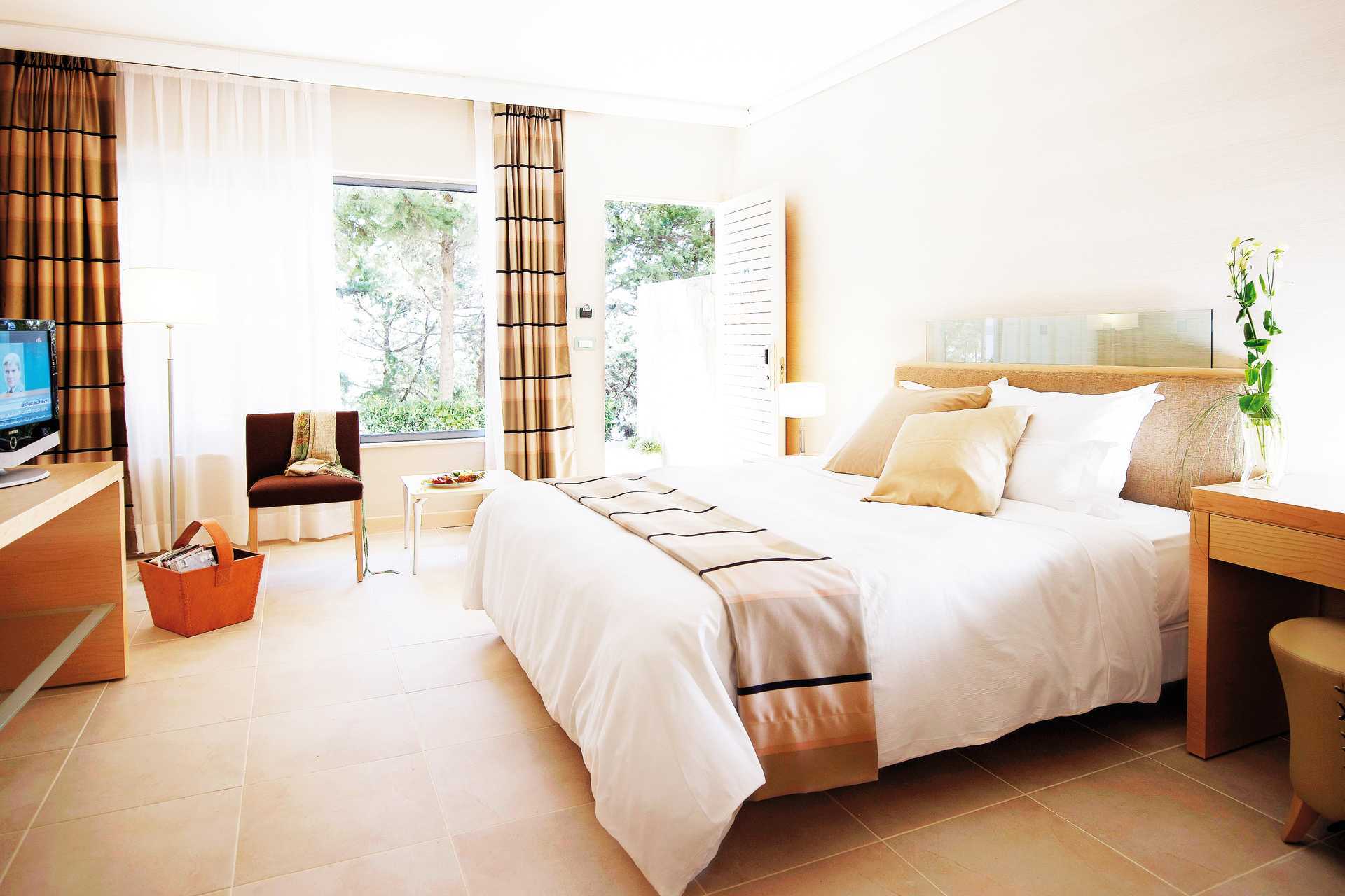 Tweepersoonskamer Garden Wing in het Rodos Palace hotel in Ixia op Rhodos, Griekenland.